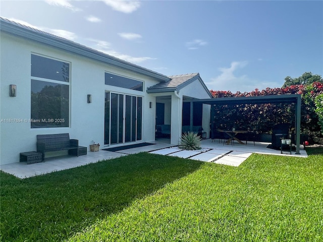 7714 NW 70th Way, Parkland, FL 33067 - back of house with a patio area, stucco siding, and a yard