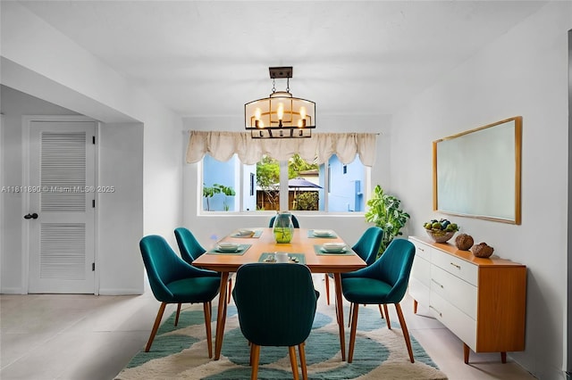81 Hough Dr, Miami Springs, FL 33166 - dining area with a chandelier and baseboards