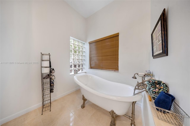 81 Hough Dr, Miami Springs, FL 33166 - bathroom featuring a freestanding bath and tile patterned flooring