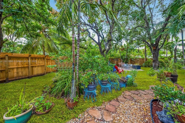 81 Hough Dr, Miami Springs, FL 33166 - fenced backyard with a patio area
