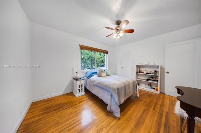 81 Hough Dr, Miami Springs, FL 33166 - bedroom featuring light wood-style flooring and a ceiling fan