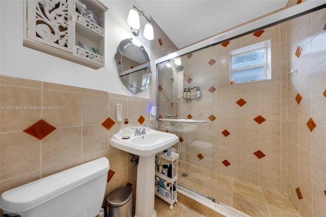 81 Hough Dr, Miami Springs, FL 33166 - bathroom featuring a shower stall and tile walls