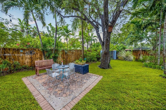 81 Hough Dr, Miami Springs, FL 33166 - fenced backyard with a patio area