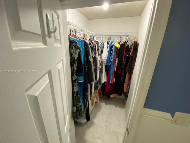 6200 NW 44th St Unit 115, Lauderhill, FL 33319 - walk in closet featuring tile patterned flooring
