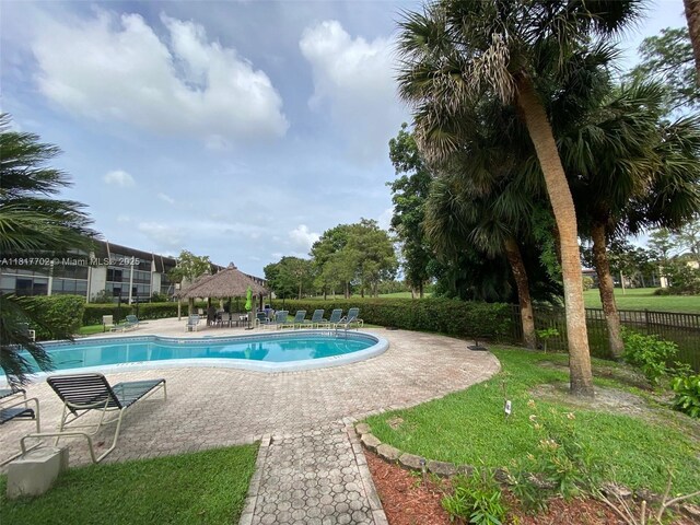 6200 NW 44th St Unit 115, Lauderhill, FL 33319 - community pool featuring a gazebo and a patio area