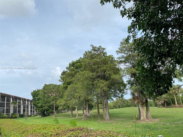 6200 NW 44th St Unit 115, Lauderhill, FL 33319 - view of home's community featuring a yard