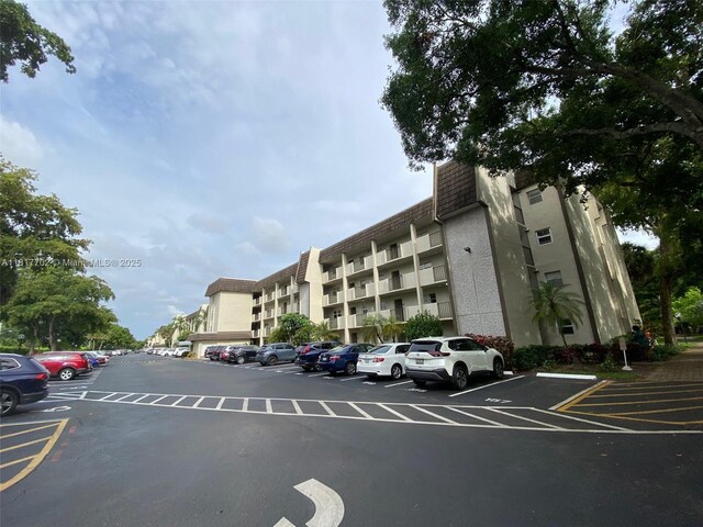 6200 NW 44th St Unit 115, Lauderhill, FL 33319 - view of apartment building / complex with uncovered parking