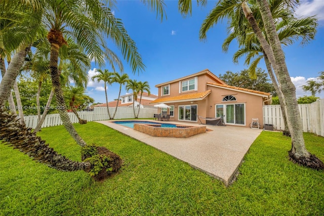 13344 NW 7th St, Plantation, FL 33325 - rear view of house with stucco siding, a patio area, and a tile roof