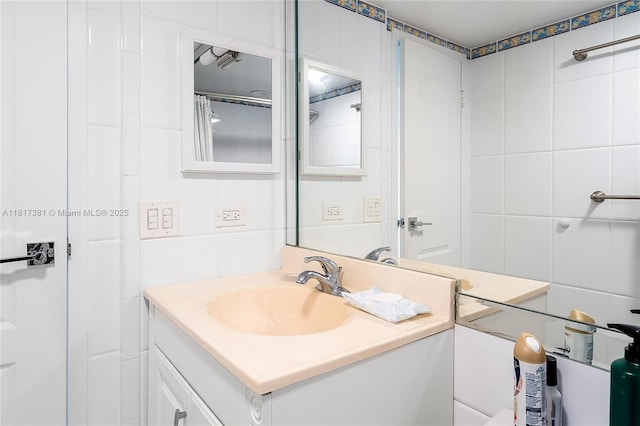 250 174th St Unit 1704, Sunny Isles Beach, FL 33160 - bathroom with tile walls and vanity