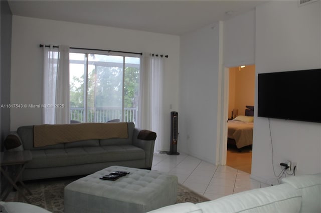 9575 Weldon Cir Unit C413, Tamarac, FL 33321 - living room featuring light tile patterned floors