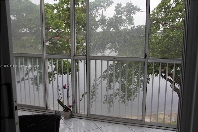 9575 Weldon Cir Unit C413, Tamarac, FL 33321 - unfurnished sunroom with a water view