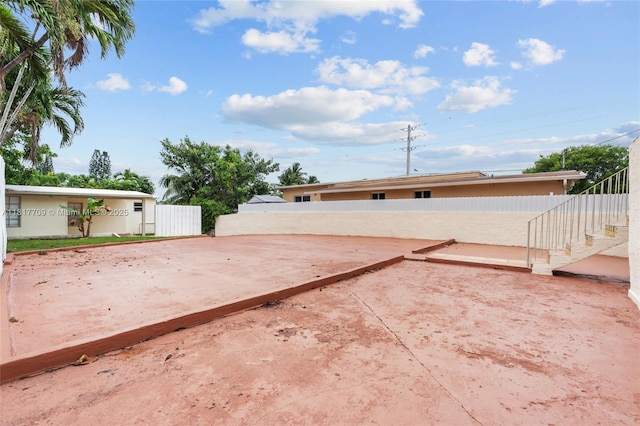 2385 SW 17th St, Miami, FL 33145 - view of yard with stairs and a patio area
