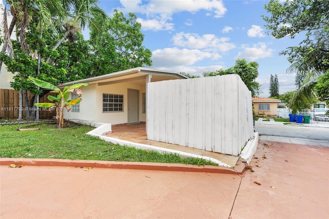 2385 SW 17th St, Miami, FL 33145 - view of front of home with stucco siding