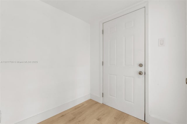 2385 SW 17th St, Miami, FL 33145 - empty room with light wood-type flooring and baseboards