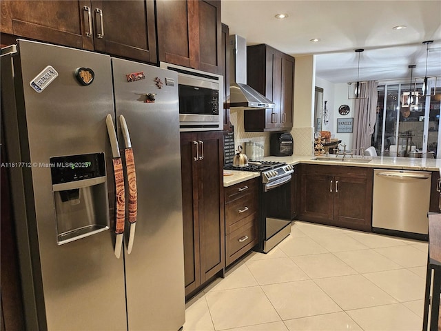 10270 NW 46th St, Doral, FL 33178 - kitchen with stainless steel appliances, wall chimney range hood, a sink, dark brown cabinets, and backsplash