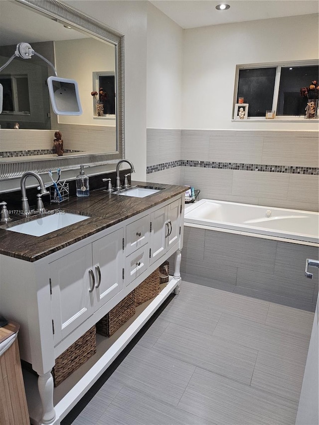 10270 NW 46th St, Doral, FL 33178 - bathroom featuring a garden tub, double vanity, and recessed lighting