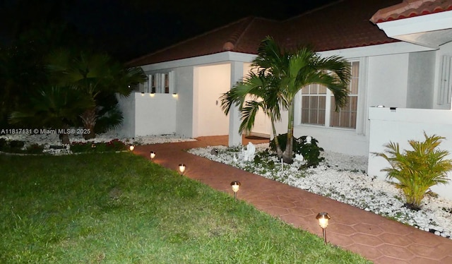 1550 SW 52nd Ter, Plantation, FL 33317 - view of side of home with stucco siding and a tile roof