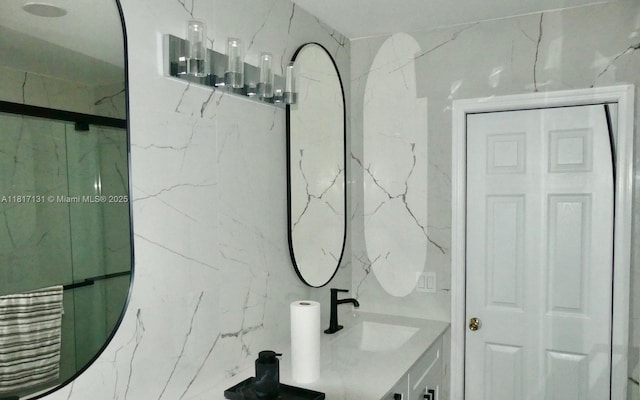 1550 SW 52nd Ter, Plantation, FL 33317 - bathroom featuring vanity and a marble finish shower