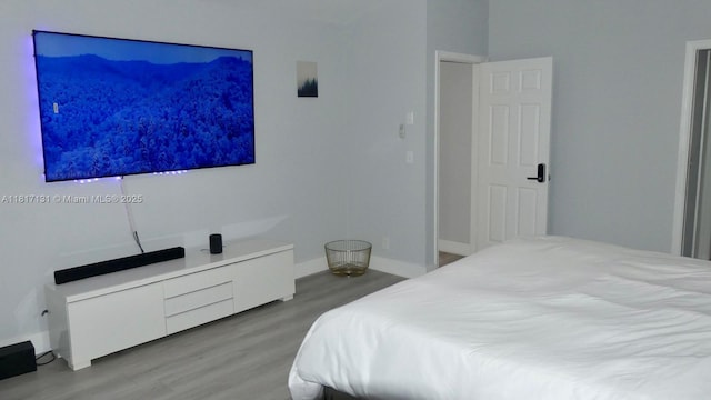 1550 SW 52nd Ter, Plantation, FL 33317 - bedroom featuring wood finished floors and baseboards