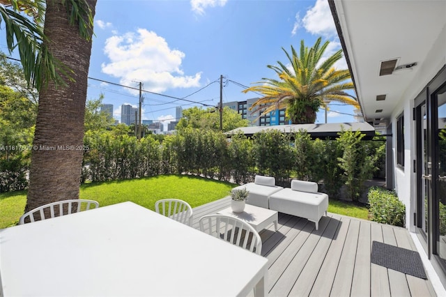 326 SW 20th Rd, Miami, FL 33129 - wooden terrace featuring outdoor dining area and a yard