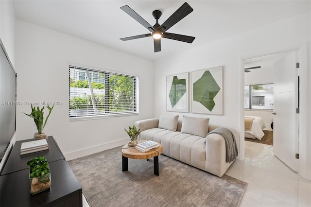 326 SW 20th Rd, Miami, FL 33129 - living area with a ceiling fan and baseboards