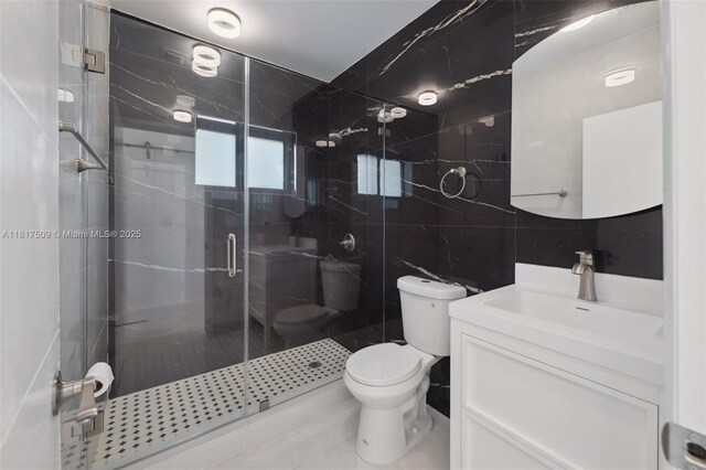 326 SW 20th Rd, Miami, FL 33129 - full bathroom with tile walls, vanity, and a shower stall