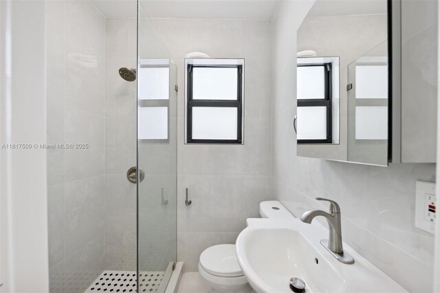 326 SW 20th Rd, Miami, FL 33129 - full bathroom featuring a shower stall and tile walls
