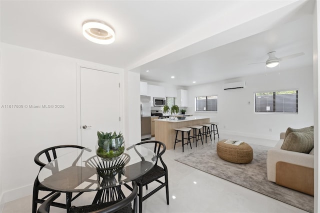 326 SW 20th Rd, Miami, FL 33129 - dining area featuring a wall unit AC, ceiling fan, and recessed lighting