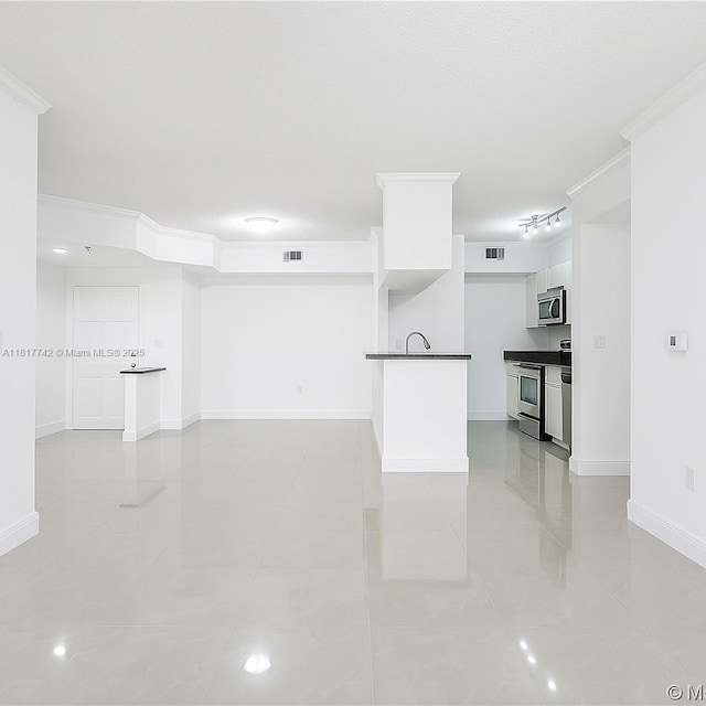 17125 N Bay Rd Unit 3104, Sunny Isles Beach, FL 33160 - unfurnished living room with light tile patterned flooring, baseboards, and ornamental molding