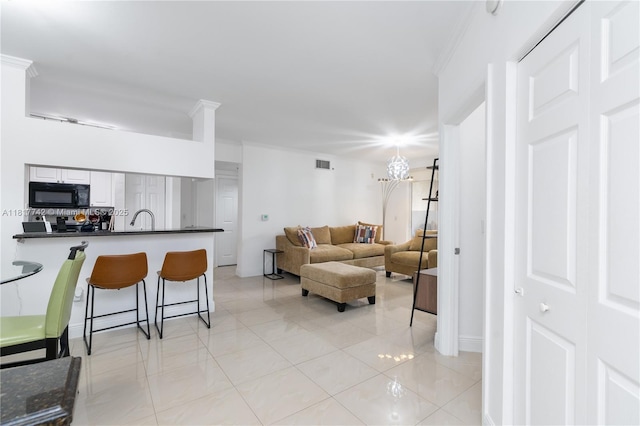 17125 N Bay Rd Unit 3104, Sunny Isles Beach, FL 33160 - living area featuring light tile patterned floors and baseboards