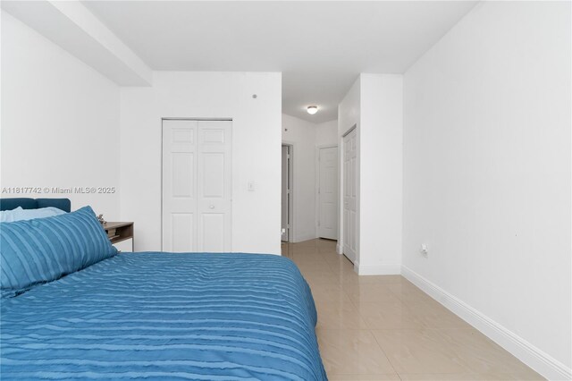 17125 N Bay Rd Unit 3104, Sunny Isles Beach, FL 33160 - bedroom featuring baseboards
