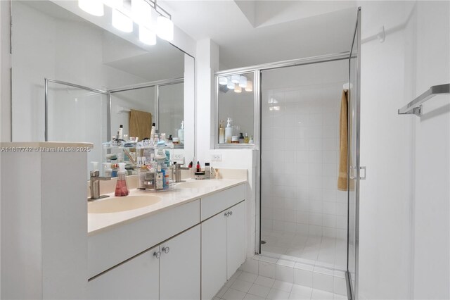 17125 N Bay Rd Unit 3104, Sunny Isles Beach, FL 33160 - full bath with double vanity, a shower stall, and tile patterned floors