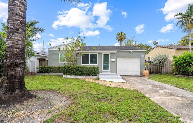 1636 Arthur St, Hollywood, FL 33020 - single story home with stucco siding, an attached garage, and driveway