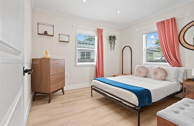 1636 Arthur St, Hollywood, FL 33020 - bedroom featuring ornamental molding, light wood-style floors, and baseboards
