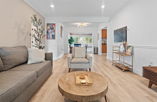 1636 Arthur St, Hollywood, FL 33020 - living area featuring light wood-type flooring, crown molding, a chandelier, baseboards, and recessed lighting