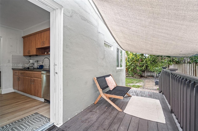 1636 Arthur St, Hollywood, FL 33020 - wooden deck with a fenced backyard and a sink