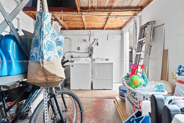 1636 Arthur St, Hollywood, FL 33020 - laundry area featuring separate washer and dryer and concrete block wall