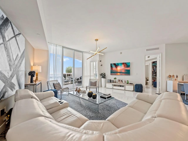 15901 Collins Ave Unit 403, Sunny Isles Beach, FL 33160 - living room featuring a chandelier and floor to ceiling windows