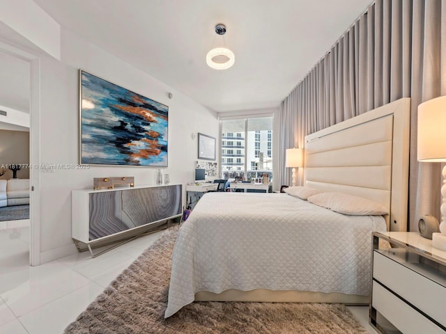 15901 Collins Ave Unit 403, Sunny Isles Beach, FL 33160 - tiled bedroom with baseboards