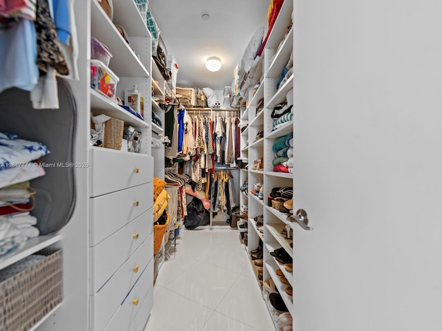 15901 Collins Ave Unit 403, Sunny Isles Beach, FL 33160 - walk in closet featuring tile patterned flooring