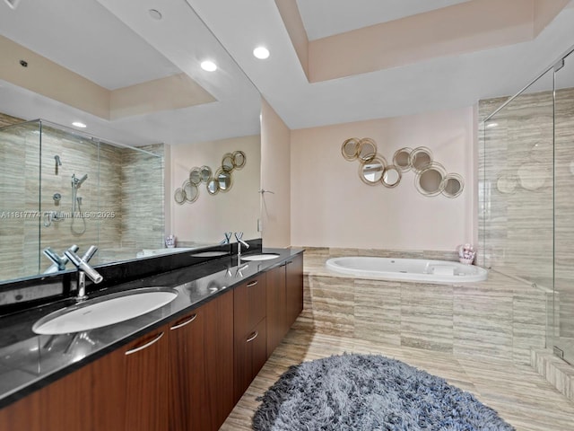 15901 Collins Ave Unit 403, Sunny Isles Beach, FL 33160 - bathroom featuring double vanity, a garden tub, a shower stall, recessed lighting, and a raised ceiling