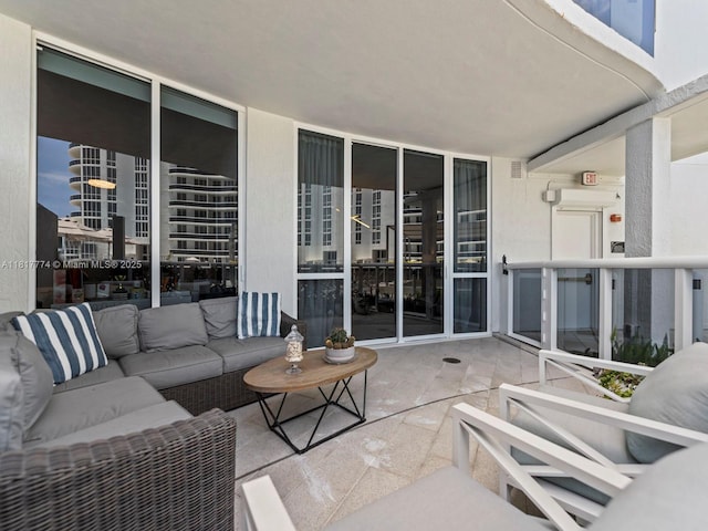 15901 Collins Ave Unit 403, Sunny Isles Beach, FL 33160 - view of patio / terrace with an outdoor hangout area