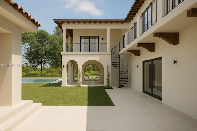 5905 N Bay Rd, Miami Beach, FL 33140 - rear view of property featuring stairway, stucco siding, a patio area, an outdoor pool, and a balcony
