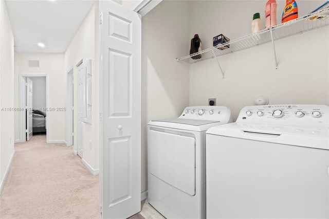 232 SE 33rd Ter, Homestead, FL 33033 - washroom with washer and clothes dryer, light colored carpet, and baseboards