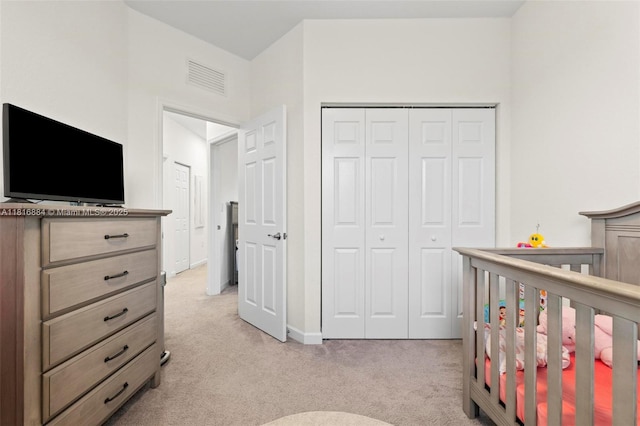 232 SE 33rd Ter, Homestead, FL 33033 - bedroom featuring light colored carpet, a closet, a crib, and baseboards