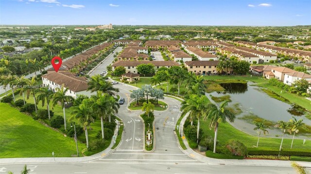 232 SE 33rd Ter, Homestead, FL 33033 - aerial perspective of suburban area featuring a large body of water