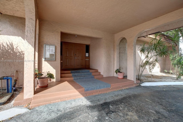 10 Seville Cir Unit 6-54, Davie, FL 33324 - doorway to property with stucco siding