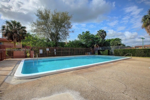 10 Seville Cir Unit 6-54, Davie, FL 33324 - community pool featuring a patio area