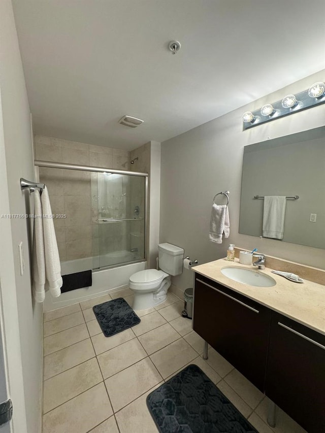 1900 N Bayshore Dr Unit 3909, Miami, FL 33132 - bathroom with vanity, toilet, combined bath / shower with glass door, and tile patterned flooring