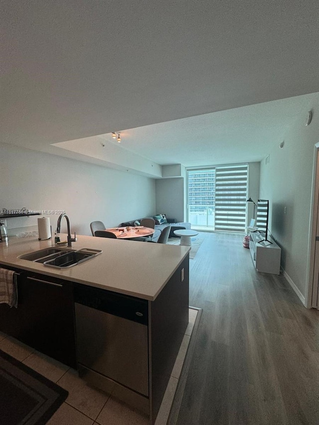 1900 N Bayshore Dr Unit 3909, Miami, FL 33132 - kitchen featuring open floor plan, light countertops, and light wood finished floors